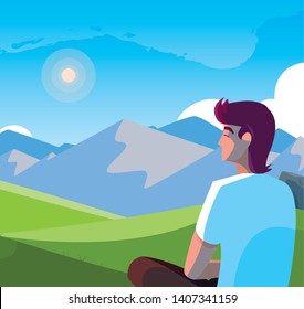 man seated observing landscape mountainous