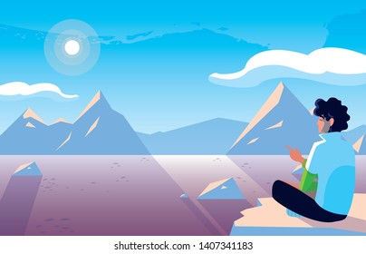 man seated observing snowscape nature