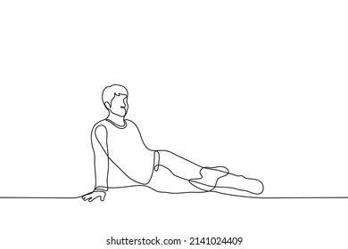 man seductively sitting on floor leaning with one hand - one line drawing vector. concept playful graceful young man sitting, queer 