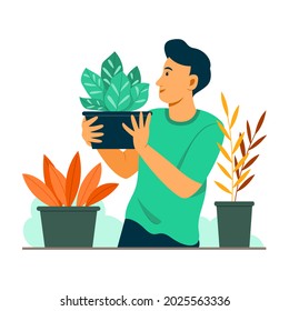 Man Select a Plant in the Garden.