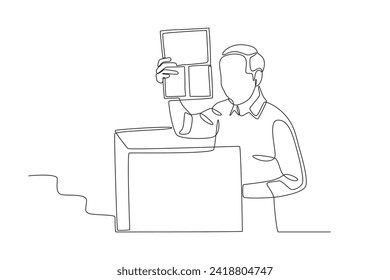 A man is selecting