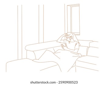 Man in self isolation on the sofa with the flu