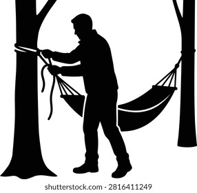 Man setting up hammock, outdoor recreation, camping, relaxation, nature.