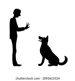 Man and sheepdog. Training lesson . Black silhouette vector image.
