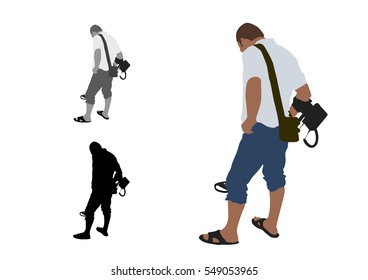Man with shorts and slippers using metal detector in beach