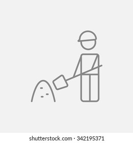 Man with shovel and hill of sand line icon for web, mobile and infographics. Vector dark grey icon isolated on light grey background.