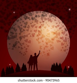 Man showing falling hearts with full moon in the background, his girlfriend