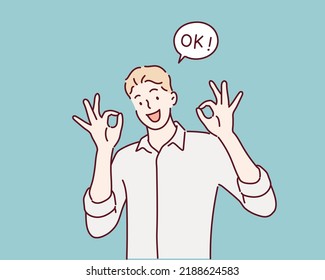 Man is showing a gesture Okay, ok. Hand drawn style vector design illustrations.