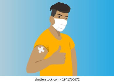 Man Showing Vaccinated Arm.Man Getting Vaccinated.A Man With Yellow Shirt And Wear The Face Mask Get The Coronavirus Vaccine .Person After Receiving Covid-19 Vaccine On Her Arm.Vaccination Concept.