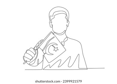 Un hombre muestra una pequeña bandera pakistaní. Dibujo de una línea en el Día de Pakistán