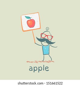 a man with a sign painted apple