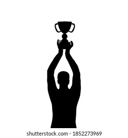 Man silhouette holding a championship trophy