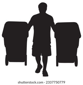 A man in silhouette is moving his trash cans