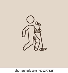 Man singing with microphone sketch icon.