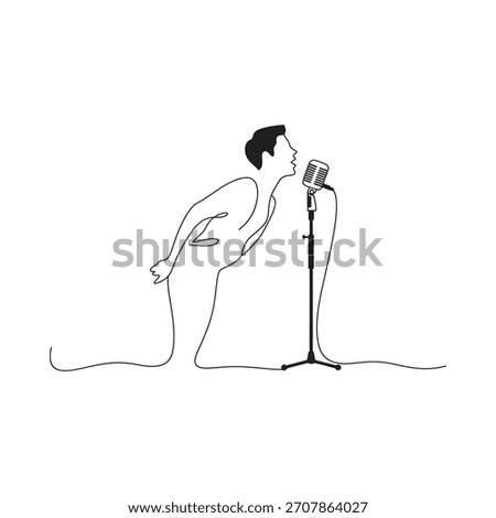 Man singing passionately into a vintage microphone