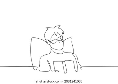 man sits in bed with back on pillow he is overtired or impressed with what he has read, glasses are out of sight - one line drawing vector. concept of overwork, shock, shocked, surprised 