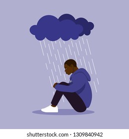  A man sits clasping his legs. Depression and melancholy. Vector flat illustration