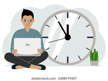 A man sits cross-legged and holds a laptop. Next to the big clock. Time management concept, little time, much time, deadline.