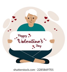 Un hombre se sienta de piernas cruzadas y lleva una tarjeta grande con una felicitación por saint valentine. Ilustración plana del vector