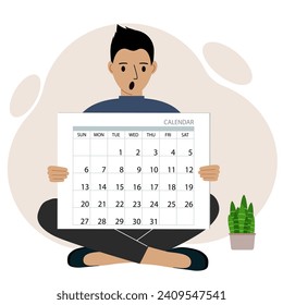 A man sits cross-legged and holds a large calendar glider in his hands. Concept of planning, make plans, schedule, event.
