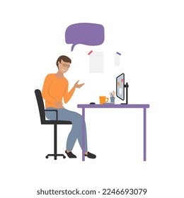 A man sits in front of a computer and communicates on the Internet with friends, colleagues, discuss, discuss a project, a concept