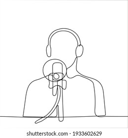 man sits in front of a professional microphone wearing over ear headphones - one line drawing. blogger during stream, podcast recording, radio interview