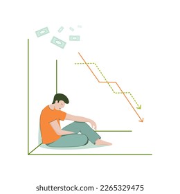 A man sits with his head down in despair over financial problems. Lack of money, poverty.