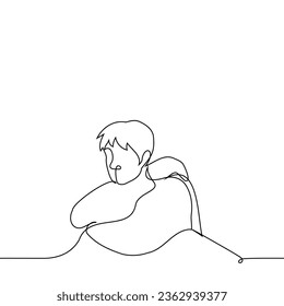 man sits hugging himself - one line art vector. concept melancholy, sadness