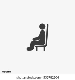 man sits icon