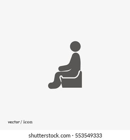 man sits icon