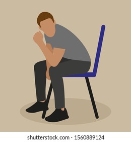 A man sits on a chair 