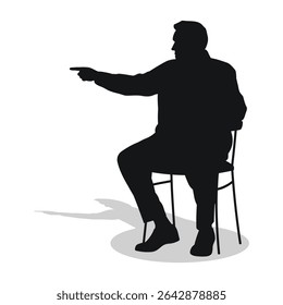 Man sits on a chair, a person points with his index finger in a direction to the side