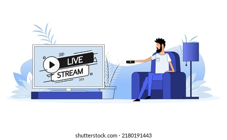 Mann sitzt auf dem Sofa, sie schalten den Kanal auf dem Fernseher - Live-Stream