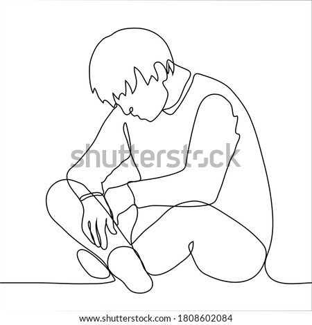 man sits on the floor with his head bowed. one continuous line drawing concept of sadness, longing, depression, fatigue, loneliness