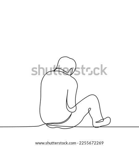 man sits on the ground or on the floor with his head down with his back to the viewer - one line drawing vector. concept loneliness, give up, be abandoned, outcast