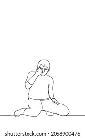 man sits on knees he looks at his tightly clenched fist - one line drawing. concept of catching insect with hand; find a jewel; consider something very small 