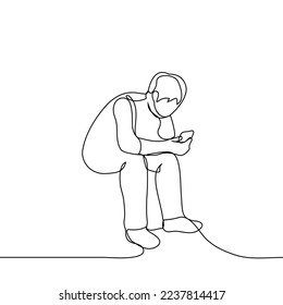man sits with a phone in his hand and swipes - one line drawing vector. concept mobile online surfing