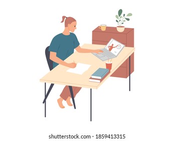 Man sits at a table watching an educational video and taking notes