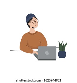A man sits at a table and works on a laptop. Desktop with a plant. The guy with glasses and a hat. Greens in workspaces. Cartoon flat illustration. isolated on white background
