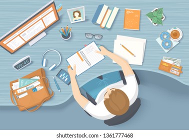 Man sits at the work table. Workplace Desktop Workspace Chair, office supplies, monitor, books, notebook, headphones, phone, purse, glasses, pen, paper, tea, donuts, bag. Vector Top view 
