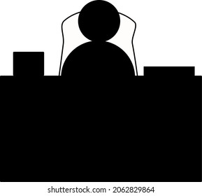 Man sitting behind a desk