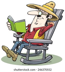 Man sitting in the chair and reading a book