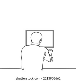 man sitting at computer - one line drawing vector. concept computer game player, freelancer in the process of work