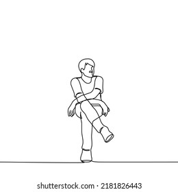 man sitting cross-legged - one line drawing vector. concept relaxed sitting, procrastination, waiting
