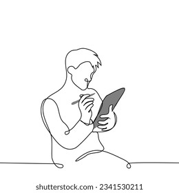 man sitting with digital tablet or graphics tablet holding stylus in right hand - one line art vector. the concept of taking notes on a tablet, digital artist