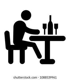 
A man sitting in dismay on a table in pub, what a glyph to denote breakup
