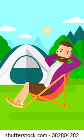 Man sitting in folding chair.