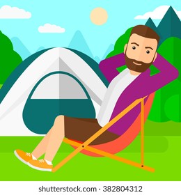 Man sitting in folding chair.