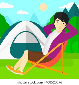 Man sitting in folding chair.