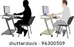 man sitting in front of computer